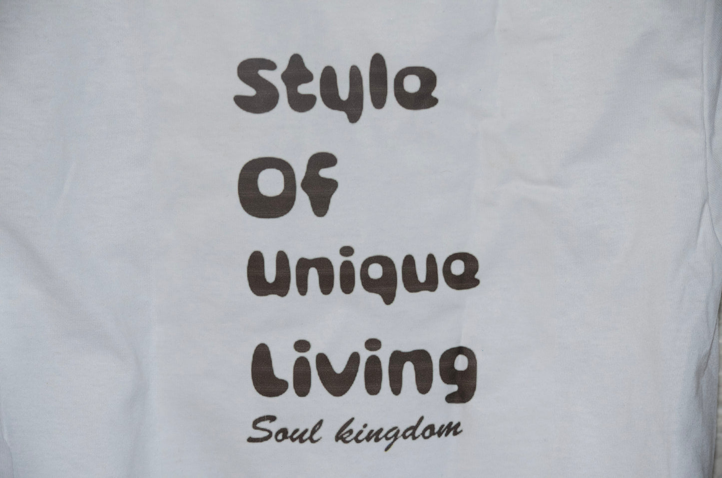 SK Style of unique living  T-Shirt